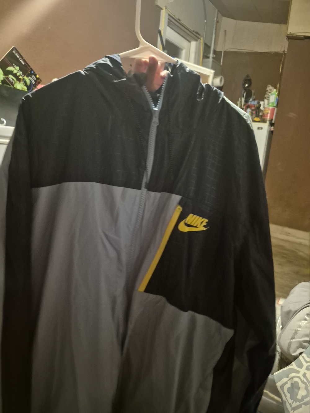 Nike Men's Black & Gray Hooded Windbreaker with Yellow Logo Accent